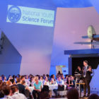 Richard Payne giving a presentation in front of lots of people