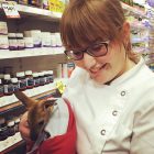 Alison Keane holding a baby kangaroo
