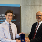 Young man receiving an award