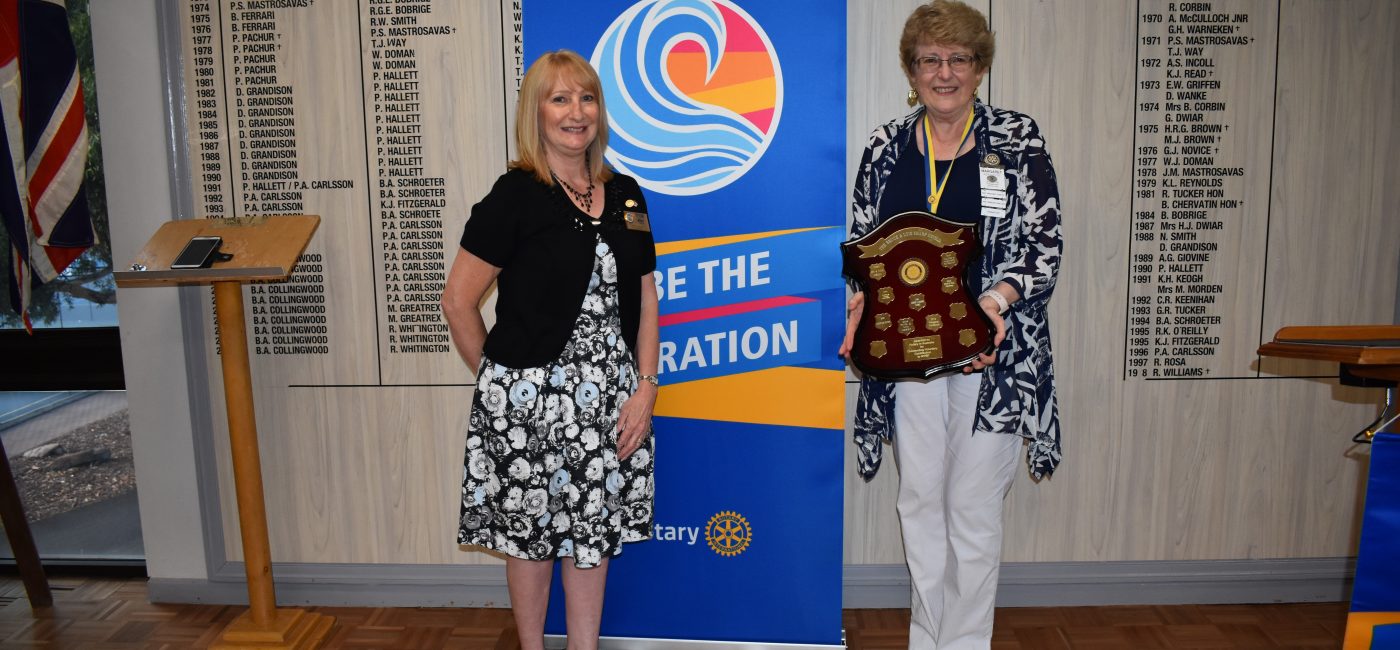 Rotary District Governor 9520 Kim Harvey presenting the Bruce and Lois Sharp Award to Margaret Northcote, NYSF District Chair 9520